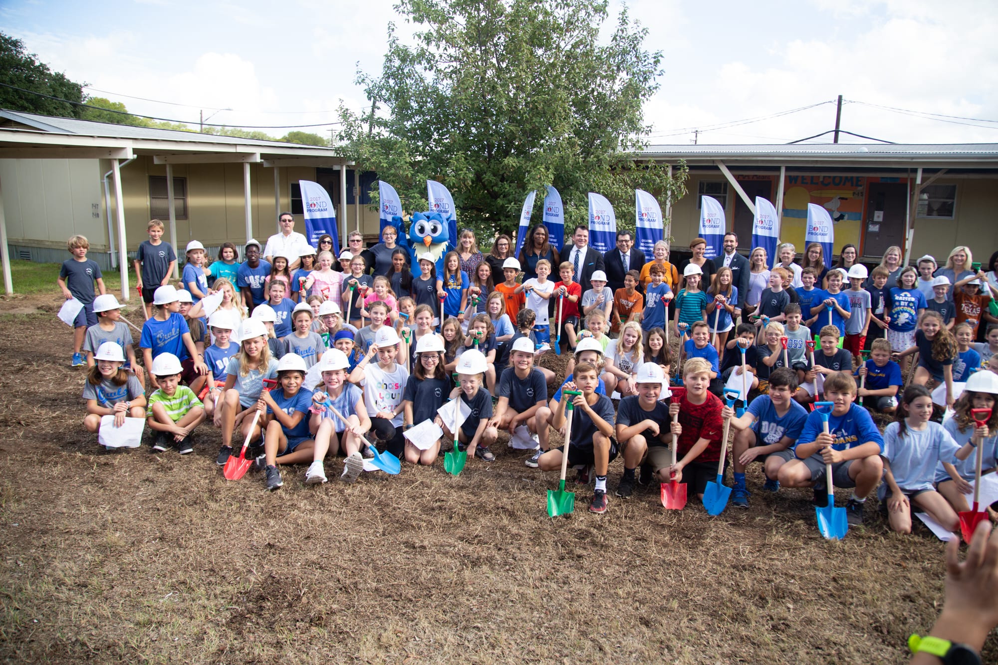 Fifth grade students take part in the groundbreaking ceremony for the Doss Elementary School modernization